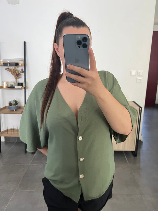 Blouse kaki défectueuse